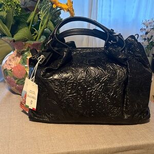 Isadora Black Embossed Satchel comes with dust bag.